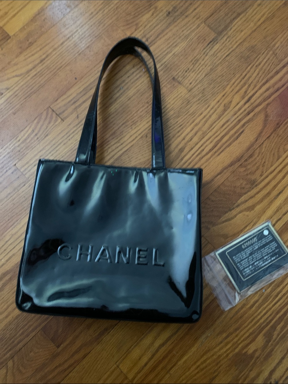 CHANEL Black Patent Embossed Logo Tote
